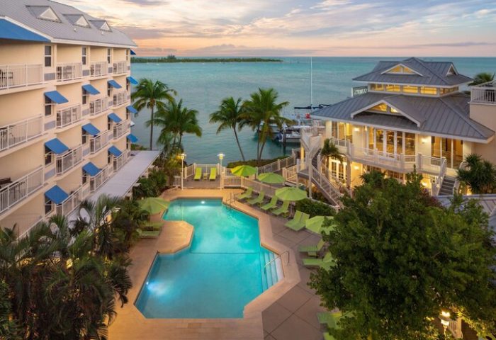 Hyatt Centric Key West Resort pool view. Gay-friendly hotel with spa, palm trees, and ocean. A tropical paradise for gay travelers.