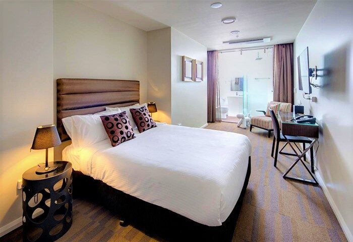 Hotel 57 room. Modern, gay-friendly hotel room with bed, desk, TV, and ensuite bathroom. Ideal for gay travel. Hotel 57 is a great choice.