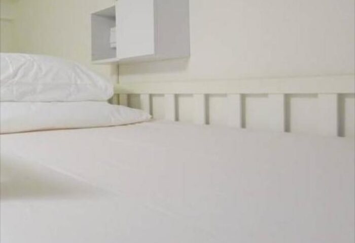 5footway.inn Project Chinatown bed detail. Gay-friendly hotel offers clean, minimalist rooms. Perfect for gay men's travel in Singapore.