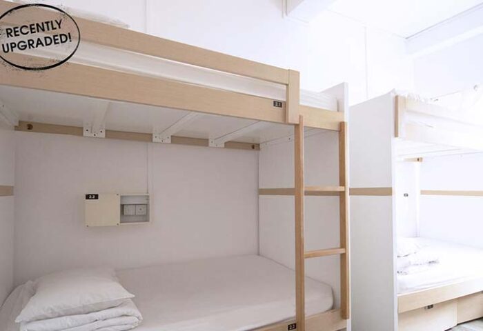 5footway.inn Project Chinatown gay-friendly hotel: A recently upgraded, minimalist bunk bed in a bright, clean hostel room. Great for budget travel.