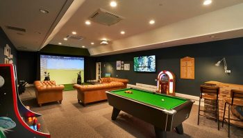 Crieff Hydro gay-friendly hotel games room. Billiards, jukebox, golf simulator, arcade game, and bar for gay men's travel advice.