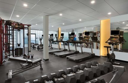 Sonesta Fort Lauderdale Beach gay-friendly hotel gym. Fitness center with treadmills, weights, and exercise equipment for a healthy vacation.