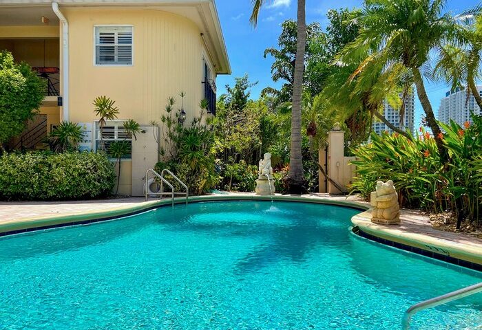 La Casa Hotel's pool at this gay-friendly hotel. Lush tropical plants surround the pool. A relaxing vacation spot for gay men.