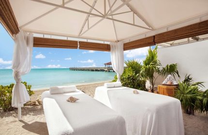 Casa Marina Key West's gay-friendly spa. Two massage beds under a canopy on the beach. Ocean view. Relaxing Key West experience.