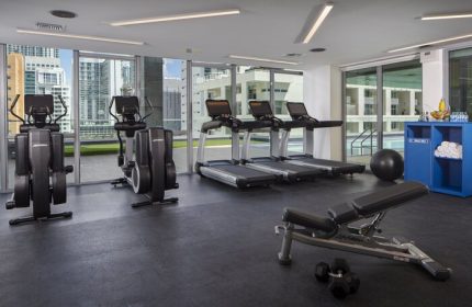 Hotel Indigo Miami Brickell gay-friendly hotel gym with treadmills, elliptical machines, weights, and city views. Fitness center for gay travelers.