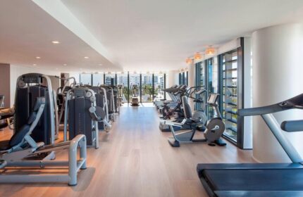 W South Beach gay-friendly hotel gym. Cardio and weight machines with city views. A great place to work out during your gay travel vacation.