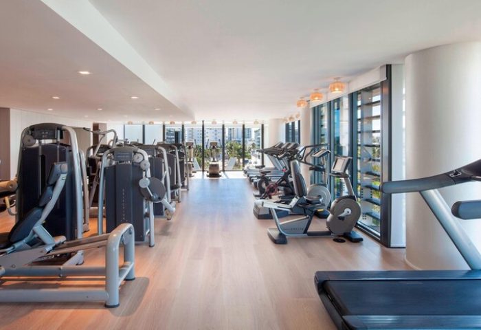 W South Beach gay-friendly hotel gym. Cardio and weight machines with city views. A great place to work out during your gay travel vacation.