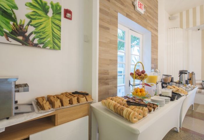 Breakfast buffet at gay-friendly President Hotel. Fresh bagels, toast, fruit, and juice are available for guests. Enjoy your stay!