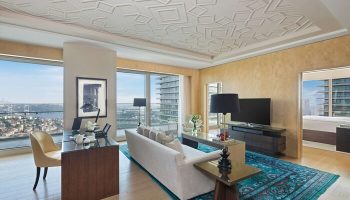Raffles Istanbul Hotel room interior. Gay-friendly hotel offers luxury with city views, modern decor, and comfortable spaces. Ideal for gay travel.
