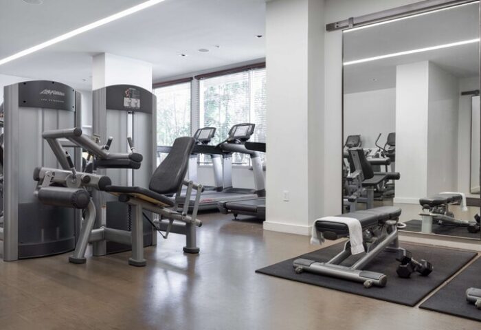 The Modern Honolulu Hilton Vacation Club gym. Gay-friendly hotel fitness center with weight machines, treadmills, and free weights.