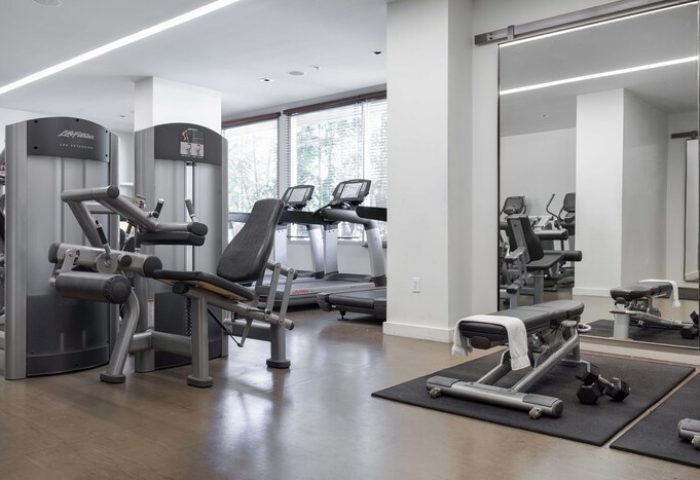 The Modern Honolulu Hilton Vacation Club gym. Gay-friendly hotel fitness center with weight machines, treadmills, and free weights.