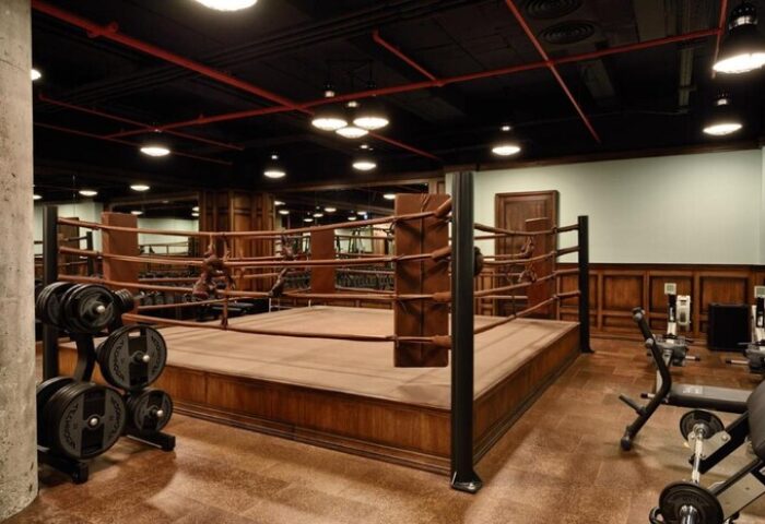 Soho House Istanbul gym with boxing ring. Gay-friendly hotel with fitness center. Travel advice for gay men. Weights and equipment.