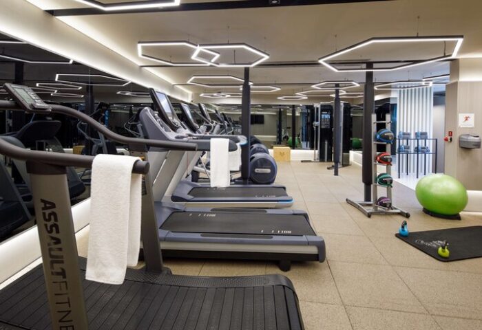 Hagia Sofia Mansions Istanbul gym. Treadmills, exercise balls, and weights. Gay-friendly hotel fitness center at Curio Collection by Hilton.