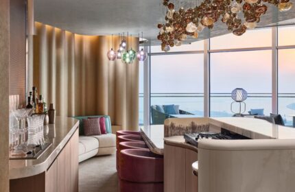 Stylish bar area at W Dubai - Mina Seyahi, a gay-friendly hotel. Features modern design, plush seating, and stunning views. #DubaiHotel #GayTravel