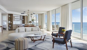Four Seasons Hotel and Residences Fort Lauderdale suite. Ocean view, living room, kitchen. Gay-friendly hotel, luxury travel.