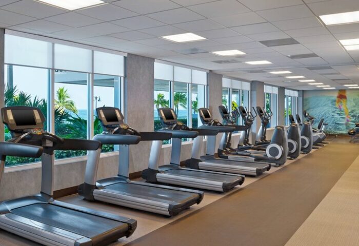 The Westin Fort Lauderdale Beach Resort gym. Treadmills and elliptical machines face ocean views. Gay-friendly hotel fitness center.