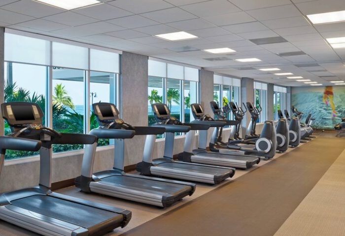 The Westin Fort Lauderdale Beach Resort gym. Treadmills and elliptical machines face ocean views. Gay-friendly hotel fitness center.