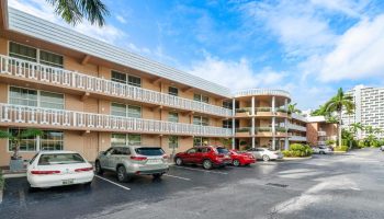 Coconut Bay Resort: Exterior view of a gay-friendly hotel with balconies and parking. A welcoming destination for gay travelers.