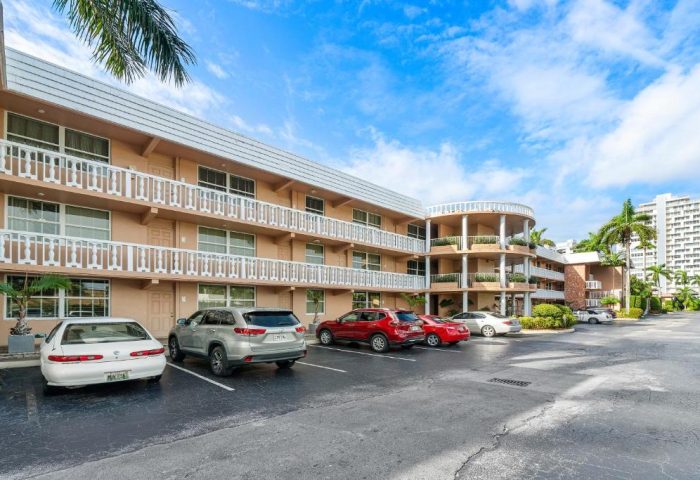 Coconut Bay Resort: Exterior view of a gay-friendly hotel with balconies and parking. A welcoming destination for gay travelers.