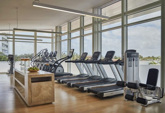 Four Seasons Hotel at The Surf Club gym. Treadmills, bikes, & weights. Gay-friendly hotel with fitness center for gay men's travel.