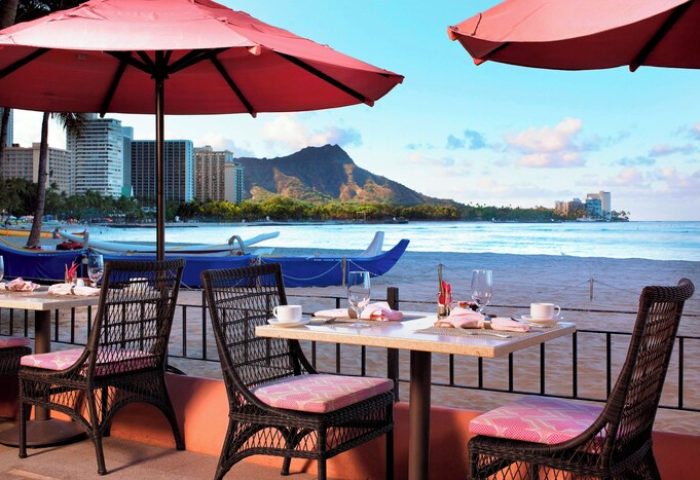 The Royal Hawaiian, a Luxury Collection Resort, Waikiki gay-friendly hotel. Beachfront dining with Diamond Head view. Perfect for gay travel.