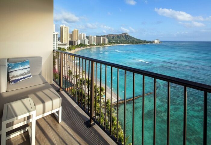 Sheraton Waikiki Beach Resort gay-friendly hotel balcony view. Diamond Head & Waikiki skyline seen from this gay travel destination.