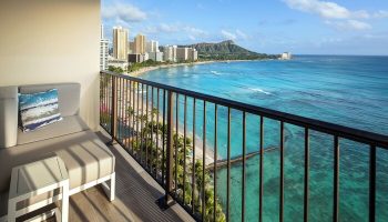 Sheraton Waikiki Beach Resort gay-friendly hotel balcony view. Diamond Head & Waikiki skyline seen from this gay travel destination.