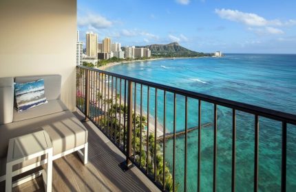 Sheraton Waikiki Beach Resort gay-friendly hotel balcony view. Diamond Head & Waikiki skyline seen from this gay travel destination.