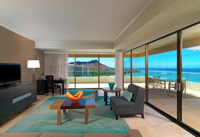 Moana Surfrider, A Westin Resort, Waikiki Beach suite with ocean views. Gay-friendly hotel room interior with Diamond Head view.