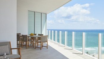 Four Seasons Hotel and Residences Fort Lauderdale balcony view. Gay-friendly hotel with ocean views. Luxury travel for gay men.