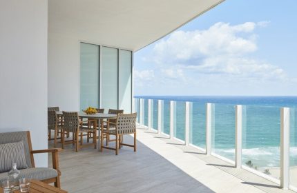 Four Seasons Hotel and Residences Fort Lauderdale balcony view. Gay-friendly hotel with ocean views. Luxury travel for gay men.