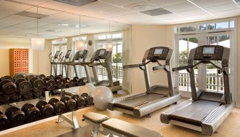 Hyatt Centric Key West Resort gym. Treadmills, weights, and fitness ball in the Gay-Friendly Hotel's workout room. Spa and exercise equipment.