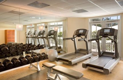 Hyatt Centric Key West Resort gym. Treadmills, weights, and fitness ball in the Gay-Friendly Hotel's workout room. Spa and exercise equipment.
