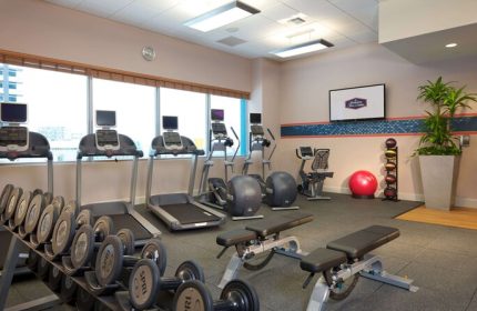 Hampton Inn & Suites Miami/Brickell-Downtown gay-friendly hotel gym. Treadmills, weights, and exercise equipment for a healthy workout.