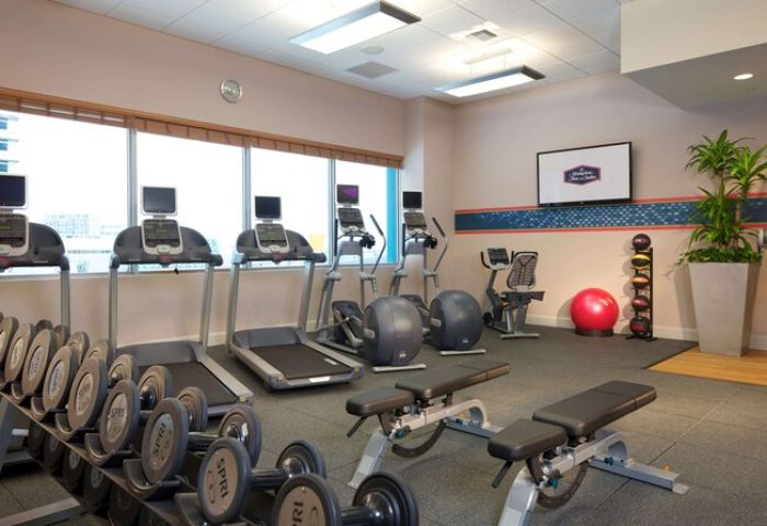 Hampton Inn & Suites Miami/Brickell-Downtown gay-friendly hotel gym. Treadmills, weights, and exercise equipment for a healthy workout.