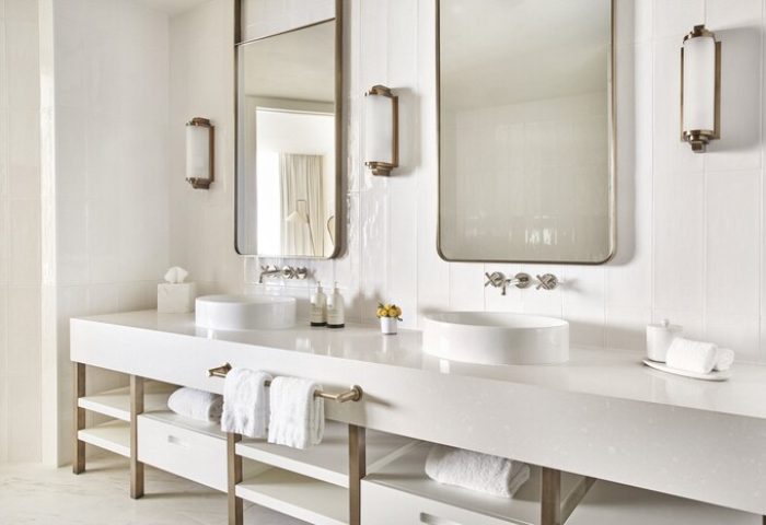 Four Seasons Hotel Fort Lauderdale: Modern, all-white bathroom with double sinks, large mirrors, and stylish fixtures. Gay-friendly hotel travel.