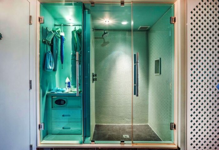 Dream South Beach, a gay-friendly hotel. Closet and shower with glass doors. A safe and drawers are in the closet. Miami Beach.