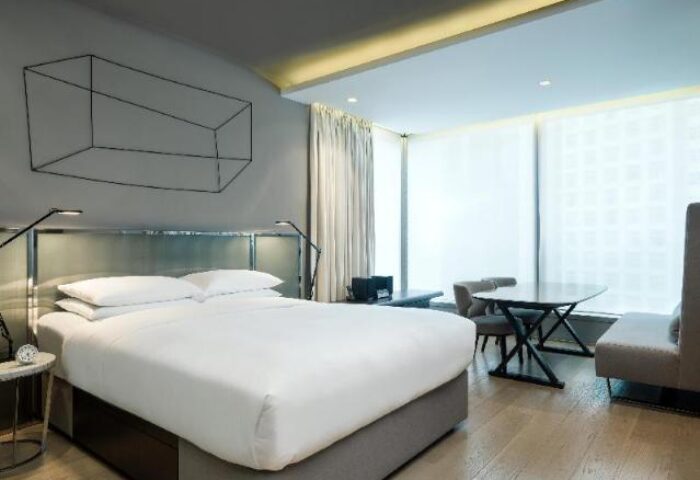 99 Bonham gay-friendly hotel room. Modern design, king bed, and city view. A great choice for gay travelers seeking comfort & style in Hong Kong.