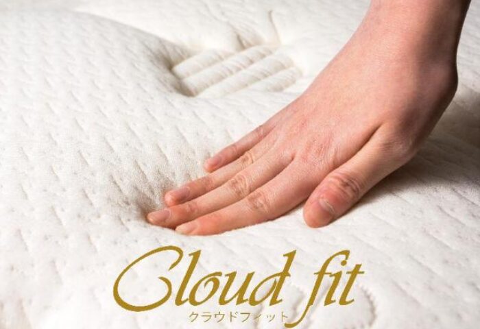 Hand pressing on a Cloud Fit mattress at APA Hotel Shinjuku-Gyoemmae. Gay-friendly hotel with comfortable bedding for a relaxing stay.