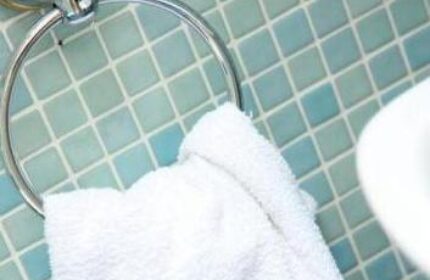 Abbey Court Hostel detail: Bathroom towel on a holder. Gay-friendly hotel with modern, clean amenities for gay men travelers. Budget-friendly.