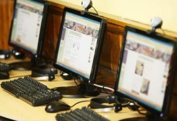 Computers at Abbey Court Hostel, a gay-friendly hotel. Desktops with webcams, keyboards, and mice. Internet access for gay travelers.