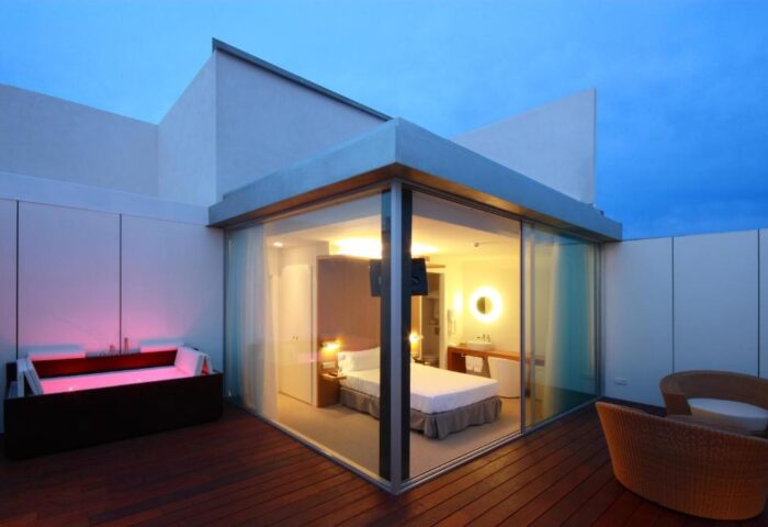 Alenti Sitges Hotel & Restaurant, a gay-friendly hotel. Room with jacuzzi on the terrace. Luxury gay travel in Sitges, Spain.