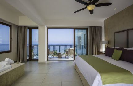 Almar Resort LGBT beachfront adults-only experience: Ocean view suite with balcony. Gay-friendly hotel room with king bed and jacuzzi.