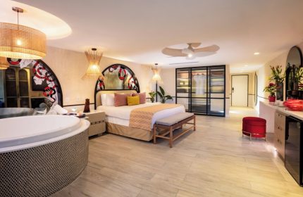 Almar Resort Luxury LGBT beachfront adults-only suite. King bed, jacuzzi, & closet. Gay-friendly hotel room for LGBT travelers.