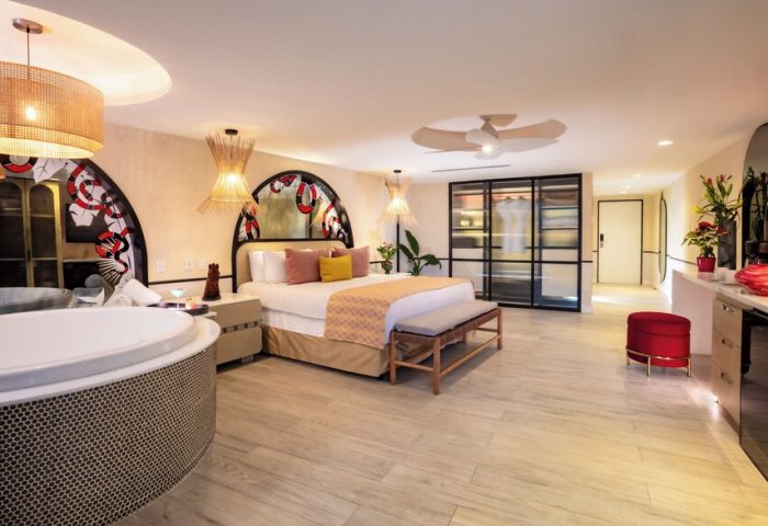 Almar Resort Luxury LGBT beachfront adults-only suite. King bed, jacuzzi, & closet. Gay-friendly hotel room for LGBT travelers.
