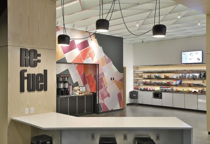 Aloft Chicago Mag Mile's Re:fuel area. This gay-friendly hotel offers snacks and drinks for guests on the go. Modern design, vibrant.