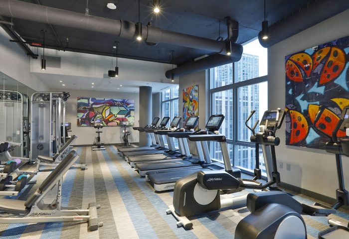 Aloft Chicago Mag Mile's gym. Gay-friendly hotel with treadmills, ellipticals, weights, and skyline views. Fitness center at Chicago hotel.