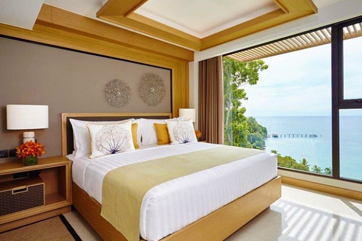 Amari Phuket gay-friendly hotel SHA-certified bedroom. King bed with ocean view. Thailand travel for gay men.