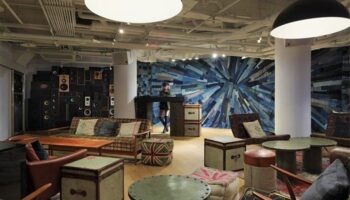 Lounge at Amba Taipei Ximending, a gay-friendly hotel. Eclectic decor, speakers, & DJ booth. Ideal for gay men travel in Taipei.
