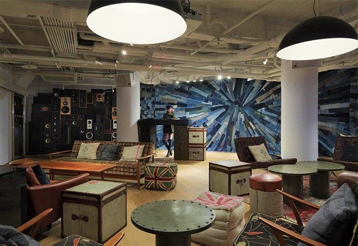 Lounge at Amba Taipei Ximending, a gay-friendly hotel. Eclectic decor, speakers, & DJ booth. Ideal for gay men travel in Taipei.